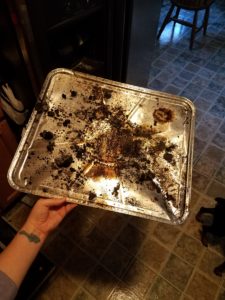 gross tray from bottom of oven